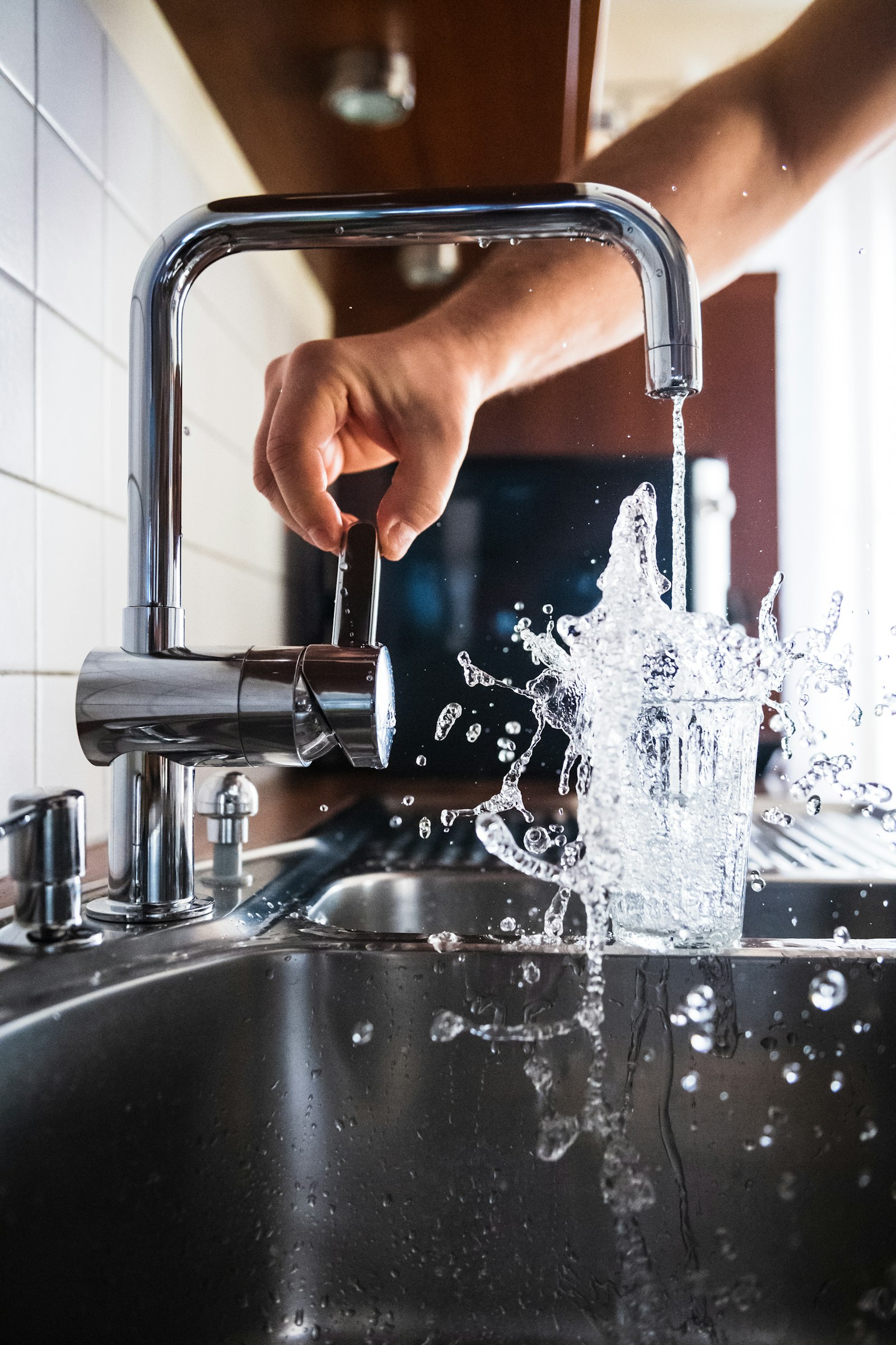 Water splashing from a kitchen faucet